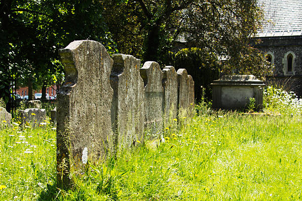Grave stones outside a church in Beaconsfield, Buckinghamshire, stock photo