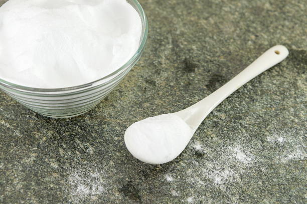 istock Baking soda in a bowl and spoon of soda 542013850
