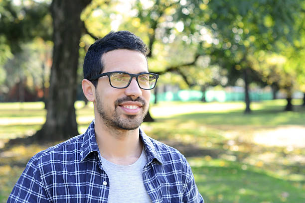 istock Close up of young man in a park. 542014524