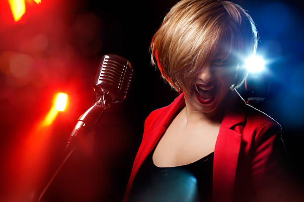 istock Woman with retro microphone 542014584