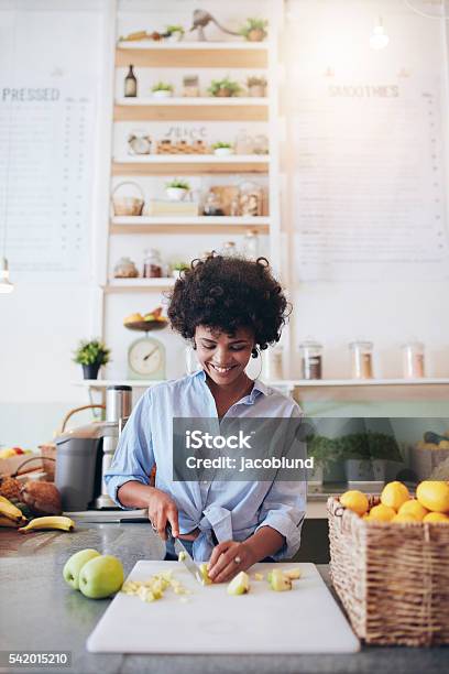 Female Bartender Working At Juice Bar Stock Photo - Download Image Now - Healthy Eating, Cooking, Women