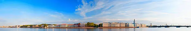 Panoramic view of historic center of Saint Petersburg, Russia. Neva river in summer morning, quay of island Vasilyevsky