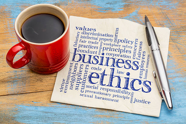 business ethics word cloud business ethics word cloud - handwriting on a napkin with cup of coffee responsible business stock pictures, royalty-free photos & images