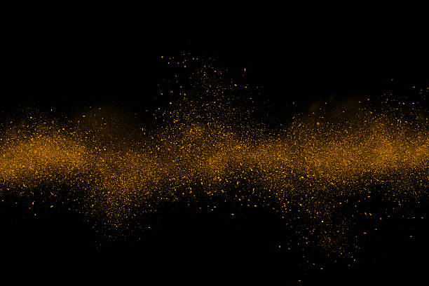Orange abstract powder explosion on a black background stock photo
