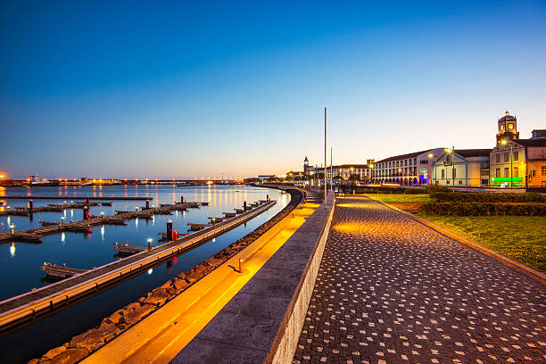 Ponta Delgada Promenade at dusk, Sao Miguel (Azores) The waterfront of Ponta Delgado on Sao Miguel (Azores) at dusk sao miguel azores stock pictures, royalty-free photos & images