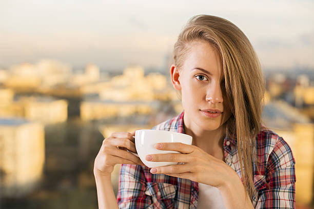 istock Woman drinking coffee 542069380
