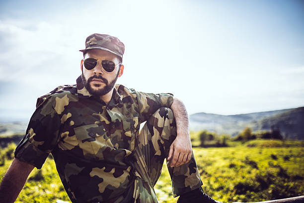 istock Soldier siting on fence 542069688