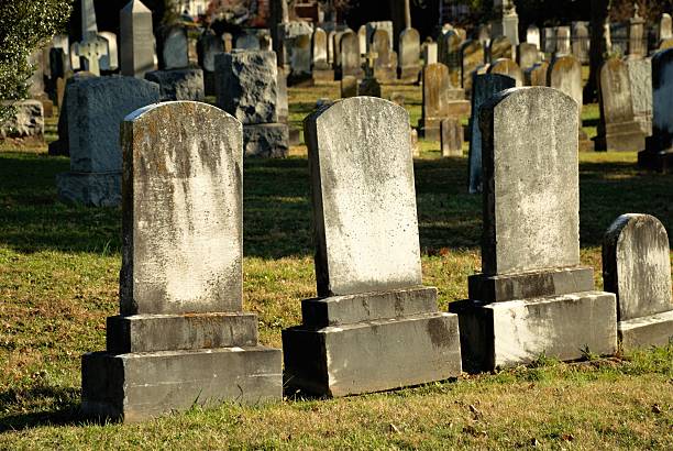 istock Tombstones in crowded old cemetery 542072456