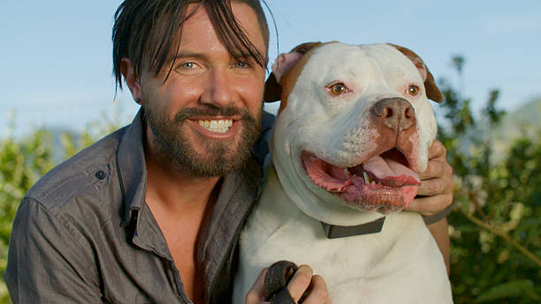 istock Pet Owner Kisses His Dog 542073094