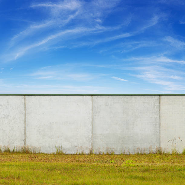 High Concrete Wall or Factory Exterior stock photo