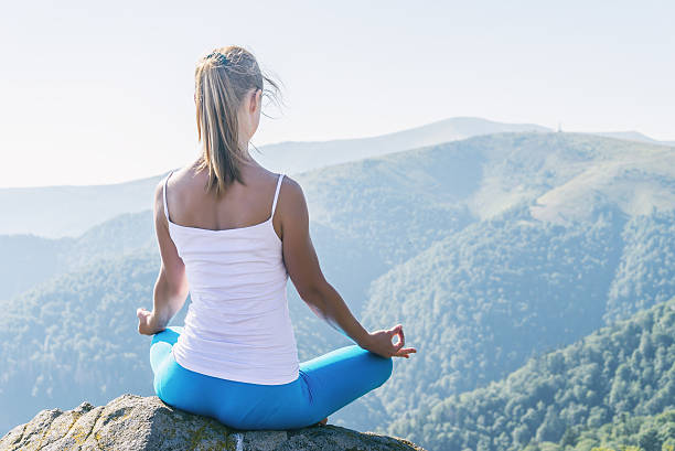 istock Young woman meditate 542076062