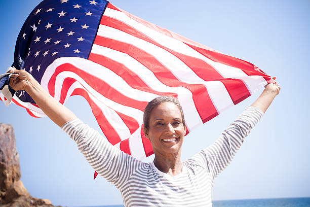 istock African American Senior Carrying USA Flag 542076546