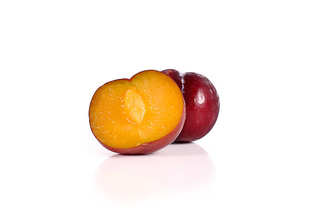istock Plums close up isolated on white background 542077268
