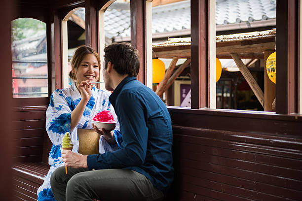 循環器 日 - women eating ice cream indigenous culture ストックフォトと画像