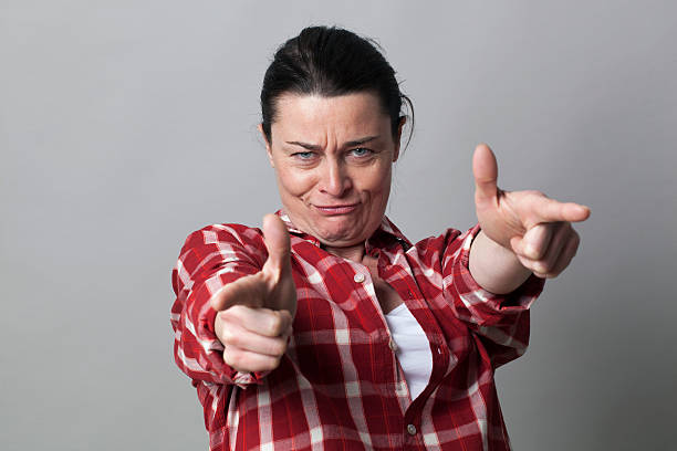 istock sexy beautiful woman pointing both fingers for independence 542078772