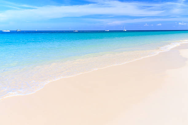 istock white sand beach with blue sky,Phuket Thailand 542080058