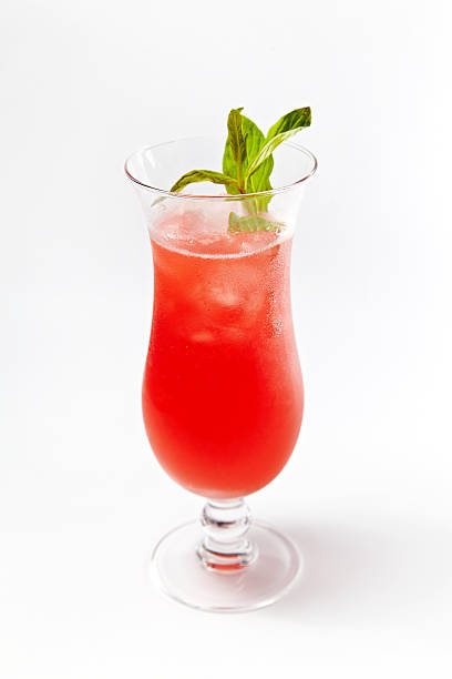 istock Red cocktail in a glass isolated on a white background 542081478