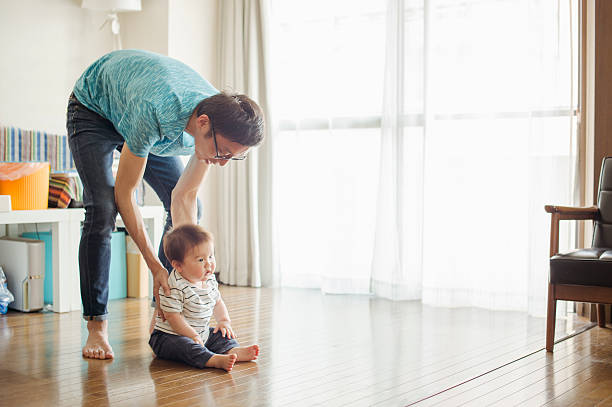 istock Father loving his baby boy at home. 542081724