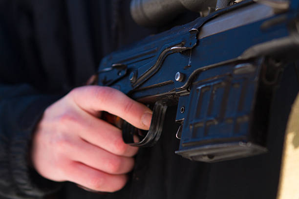 istock soldier or sniper holding gun 542081906
