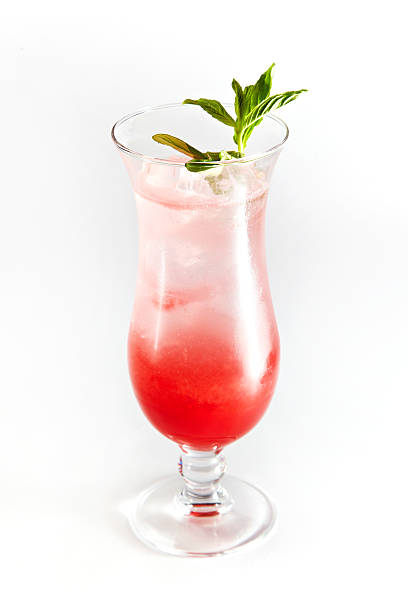 istock Colorful layered cocktail with mint isolated on white background 542083044