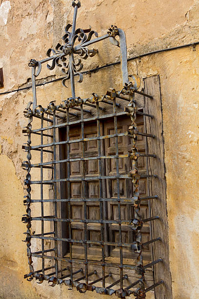 istock old window with an old fence protection 542083182