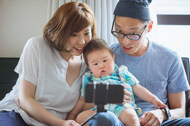 istock Family taking selfy at home 542083236