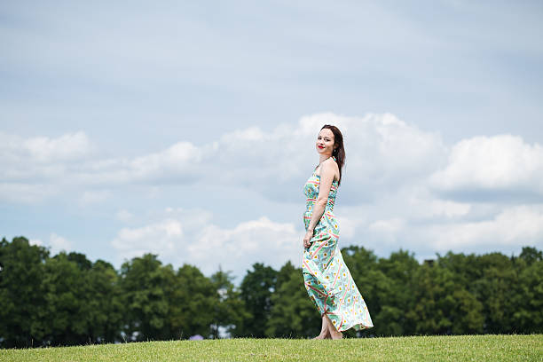 istock Beautiful girl stands on the golf course. 542085922