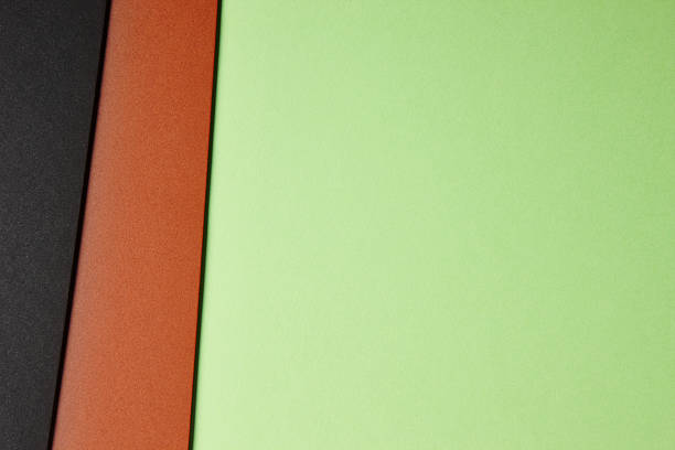 istock Colored cardboards background in green brown black tone. Copy sp 542086130