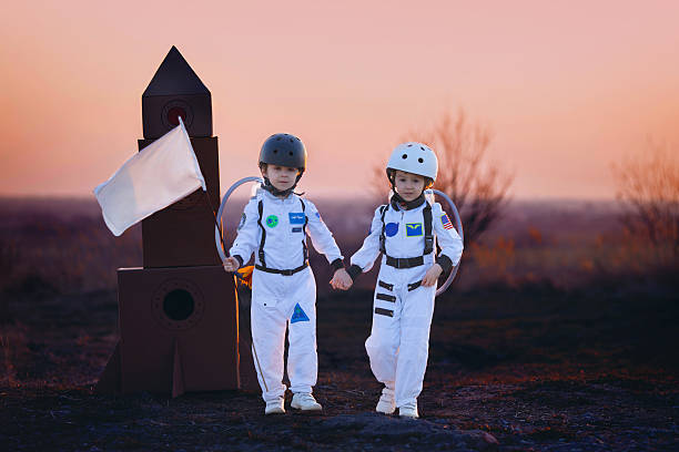 istock Two adorable children, playing in park on sunset 542087052