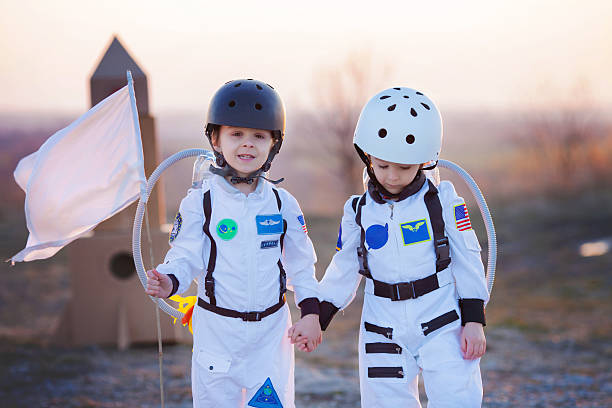 istock Two adorable children, playing in park on sunset 542087096