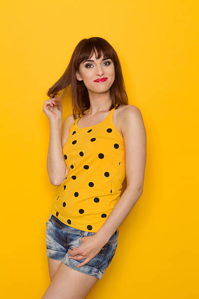 istock Happy Girl Against Yellow Background 542090908