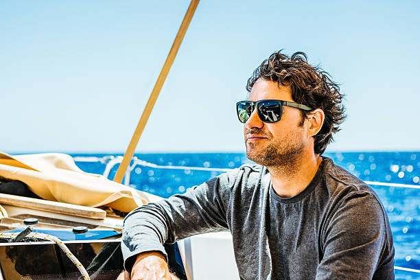 istock Man enjoying sailing with sailboat 542091672