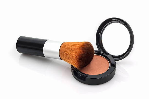istock Closeup of face powder and makeup brush. 542091818