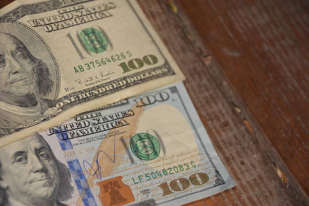 istock Hundred Dollar Bills for background. Old and new banknotes 542094596