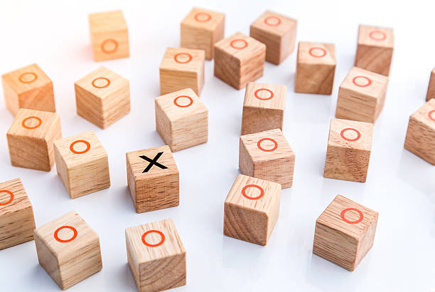 istock leadership concept with wooden geometric shapes cube 542098352