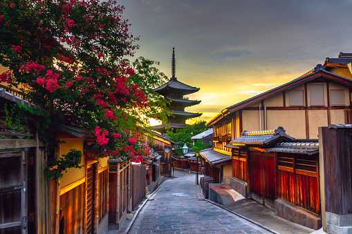 Kyoto, Japan - July 23, 2015: Yasaka Pagoda and Sannen Zaka Street,  Kyoto, Japan. Tourists wander down the narrow streets of the Higashiyama District neighbourhood in Kyoto, Japan, to look at the Yasaka Pagoda also known as Hokanji Temple