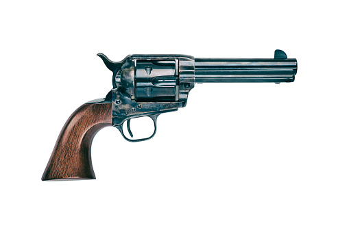 The legendary six-shooter from the Wild West, the Colt Peacemaker, sitting on a white background.