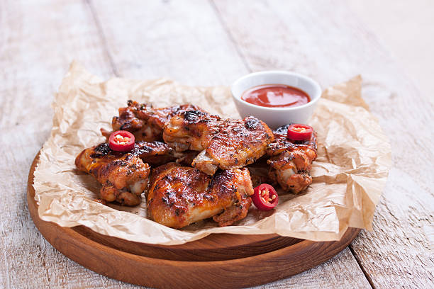 istock Roasted barbecue chicken wings with bbq sauce 542100754