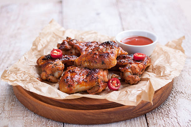 istock Roasted barbecue chicken wings with bbq sauce 542100910