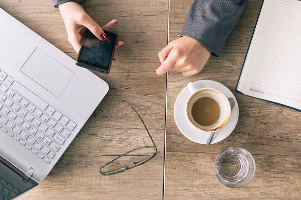 istock Business woman using mobile phone 542102862
