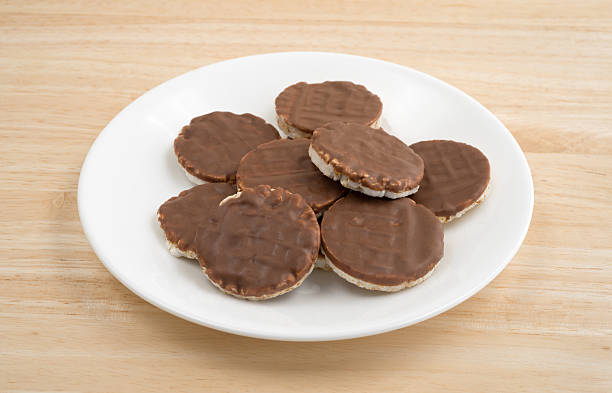 istock Organic rice cookies with milk chocolate icing on plate 542103134