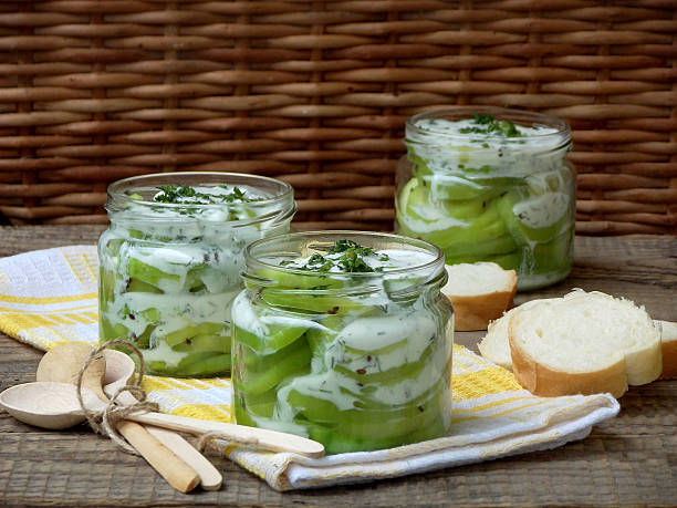 istock zucchini with yogurt sauce and fresh dill in jars 542103238