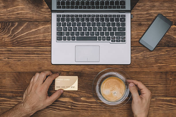 istock Shopping with credit card and drinking coffee 542103278