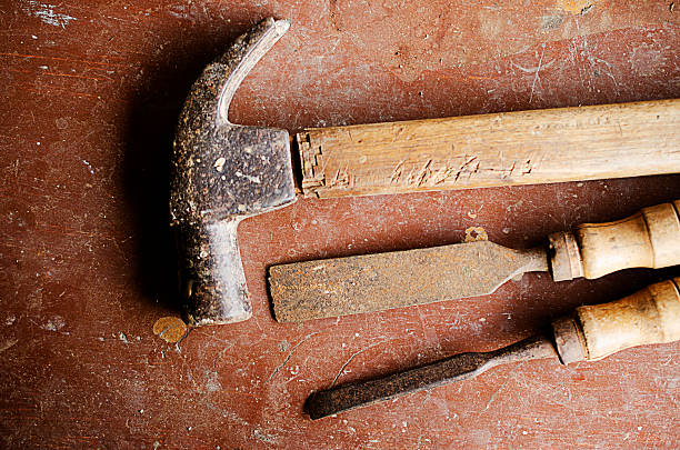 istock wooden tools with Hammer and chisel tools on wooden table 542103288