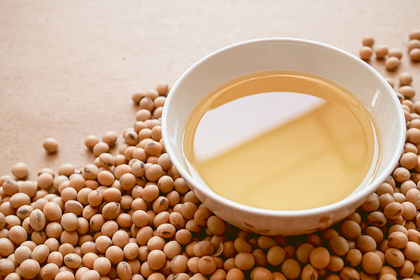 oil and soy beans on brown paper