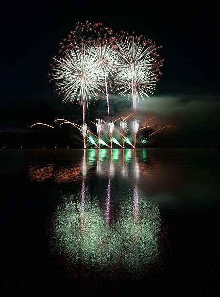 istock Colorful fireworks with reflection on lake. 542104328