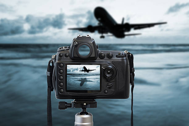 istock Camera photography top on sea sunset 542105806