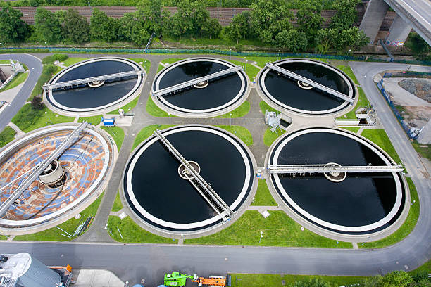 istock Sewage treatment plant - aerial view 542106876
