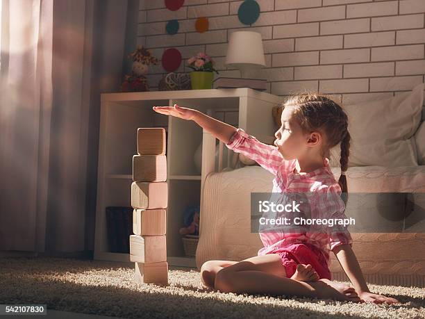 Girl Playing With Blocks Stock Photo - Download Image Now - Child, Toy Block, Construction Industry