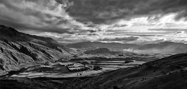 Dramatic arrowtown town in scenic vale of New Zealand South Island at Lake Hayes near QUeenstown- aerial panorama.
